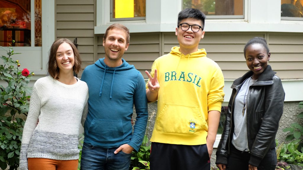 A group of homestay students and their host family